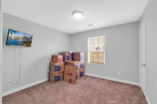 rec room featuring baseboards, visible vents, and carpet floors