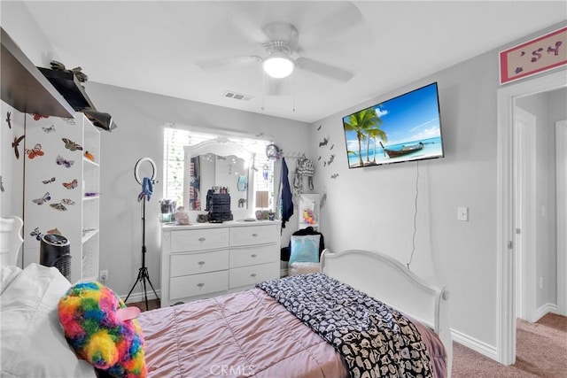 bedroom featuring visible vents, ceiling fan, baseboards, and carpet floors