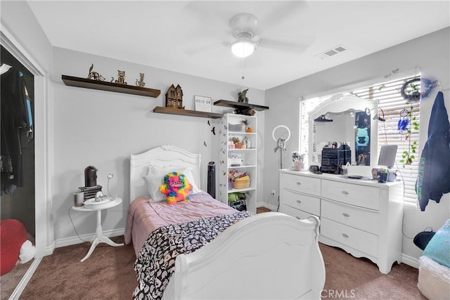 bedroom featuring light colored carpet, visible vents, and baseboards