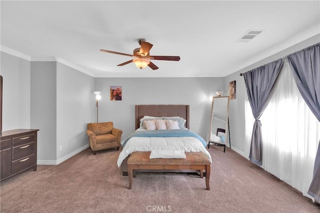 bedroom featuring visible vents, light colored carpet, crown molding, and baseboards