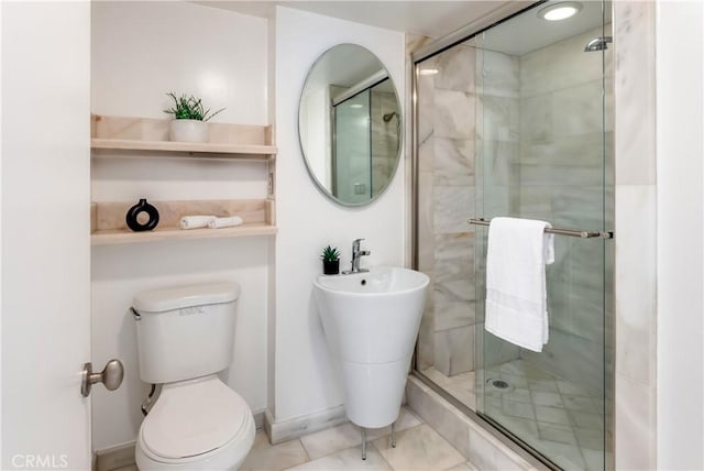 full bath with a shower stall and toilet