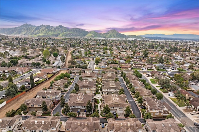 drone / aerial view with a residential view and a mountain view