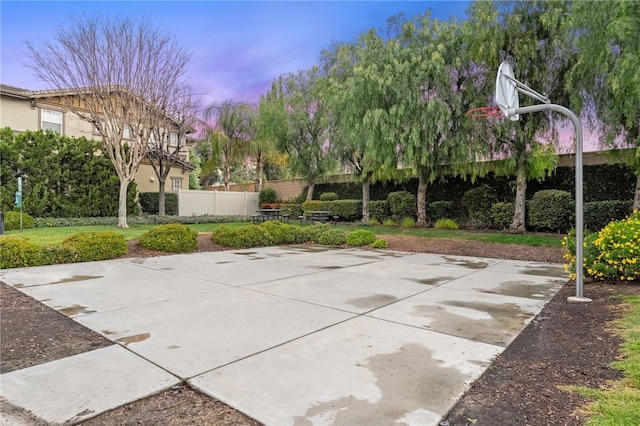 view of sport court with community basketball court and fence