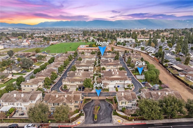 bird's eye view featuring a mountain view and a residential view