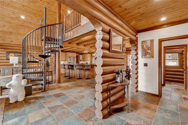 stairway featuring stone tile floors, recessed lighting, baseboards, wood ceiling, and a towering ceiling