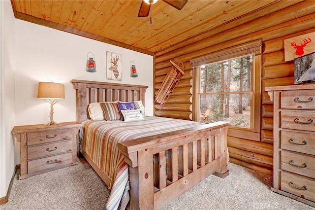 bedroom with wooden ceiling, carpet, and ceiling fan