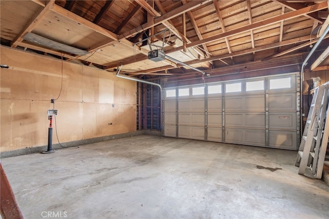 garage featuring a garage door opener