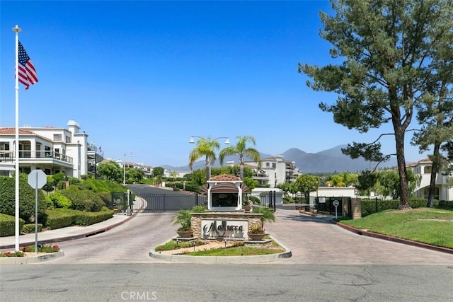 22364 Manacor Unit 9, Mission Viejo, CA 92692 - view of community featuring a gate and a mountain view
