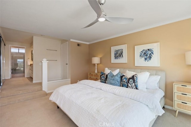 22364 Manacor Unit 9, Mission Viejo, CA 92692 - bedroom with light colored carpet, baseboards, ornamental molding, and a ceiling fan