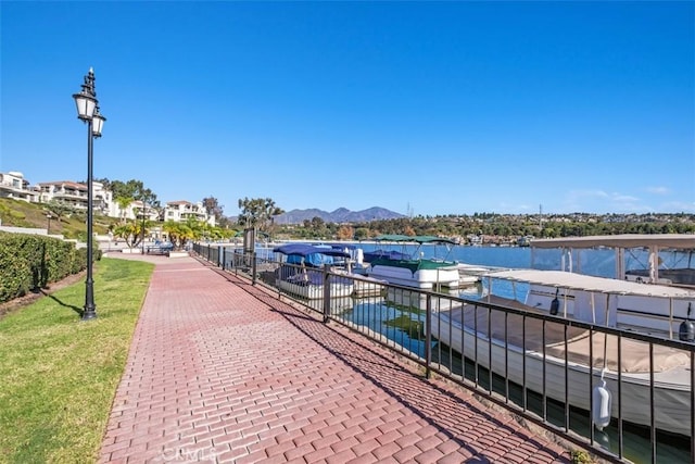 22364 Manacor Unit 9, Mission Viejo, CA 92692 - view of property's community featuring a dock and a water and mountain view