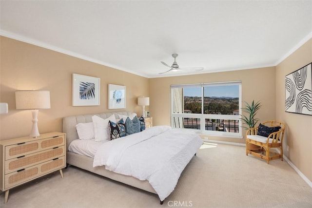 22364 Manacor Unit 9, Mission Viejo, CA 92692 - bedroom with light colored carpet, crown molding, baseboards, and ceiling fan