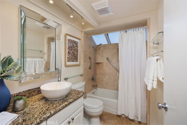 22364 Manacor Unit 9, Mission Viejo, CA 92692 - bathroom featuring vanity, shower / tub combo with curtain, and toilet