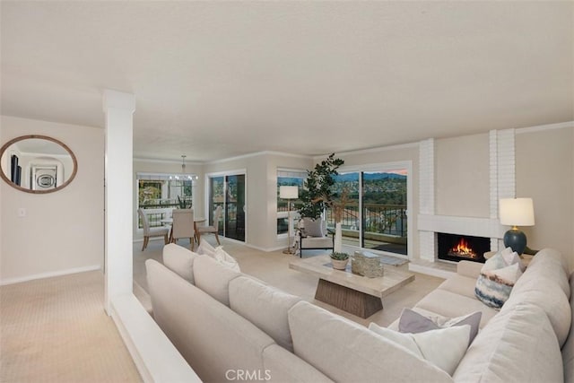 22364 Manacor Unit 9, Mission Viejo, CA 92692 - living area with light colored carpet, baseboards, and a brick fireplace