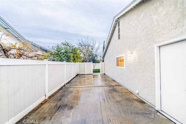 view of patio with a fenced backyard