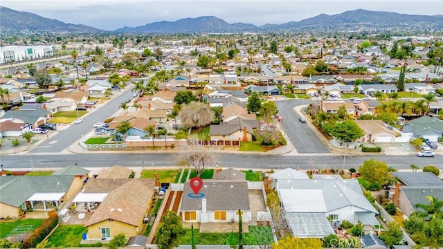 aerial view featuring a mountain view and a residential view