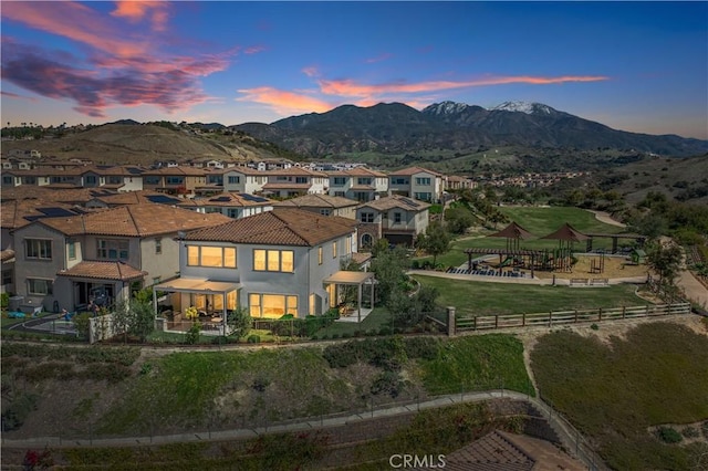 aerial view with a mountain view and a residential view