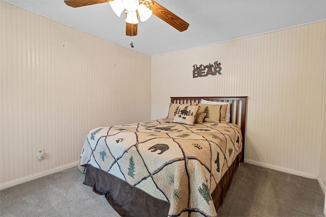 bedroom featuring baseboards, a ceiling fan, and carpet flooring