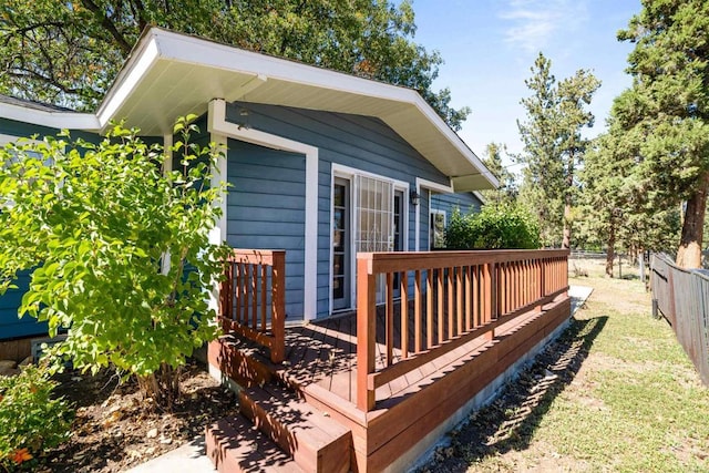 wooden deck featuring fence