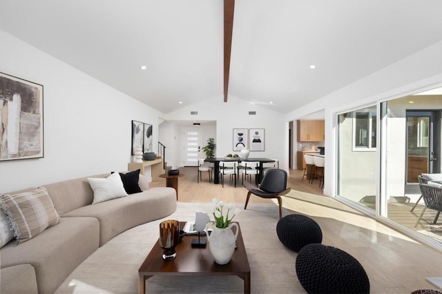 living area with beam ceiling, high vaulted ceiling, recessed lighting, stairway, and light wood finished floors