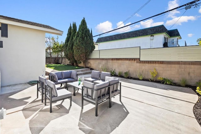 view of patio / terrace with a fenced backyard and outdoor lounge area