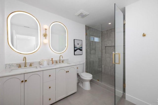 bathroom with visible vents, a stall shower, toilet, and a sink