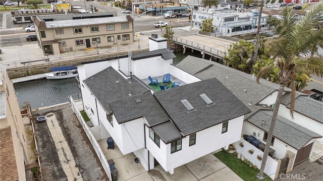 aerial view featuring a residential view and a water view