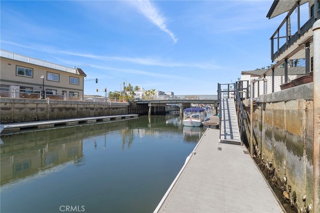 dock area featuring a water view