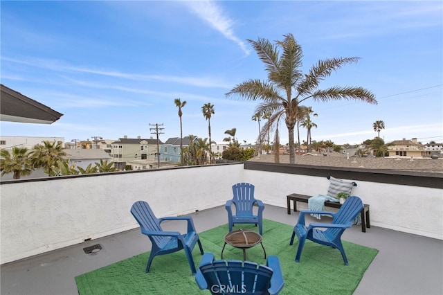 view of patio / terrace with a fire pit