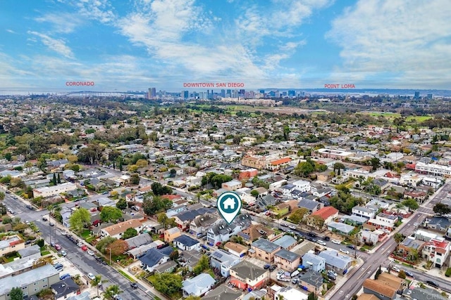 drone / aerial view featuring a city view