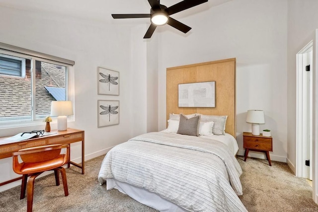 bedroom with baseboards, light carpet, and ceiling fan