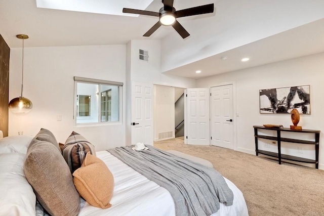 bedroom featuring recessed lighting, visible vents, light colored carpet, and a ceiling fan