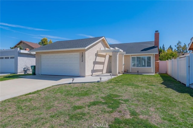 ranch-style home with stucco siding, fence, concrete driveway, a front yard, and an attached garage