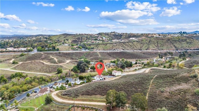 bird's eye view with a mountain view