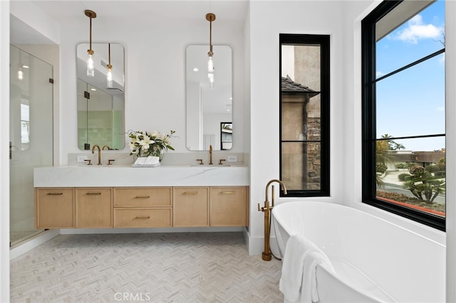 506 Avocado Ave, Corona Del Mar, CA 92625 - bathroom featuring double vanity, a soaking tub, a stall shower, and a sink