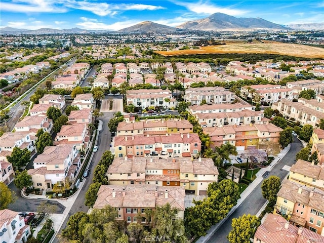 aerial view with a mountain view and a residential view