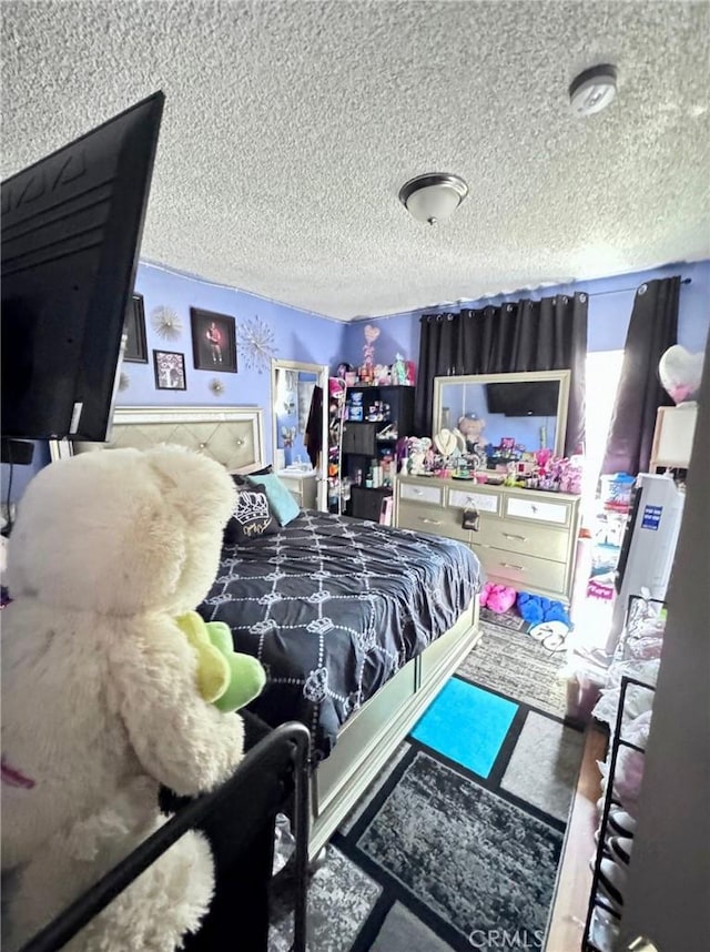 bedroom with a textured ceiling