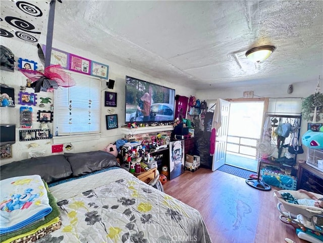 bedroom featuring wood finished floors