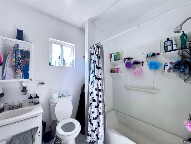 bathroom featuring toilet, shower / bath combo, and vanity