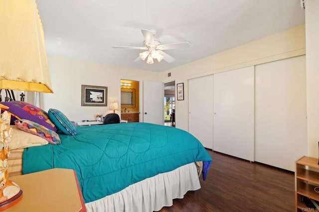 bedroom featuring a closet, wood finished floors, and a ceiling fan