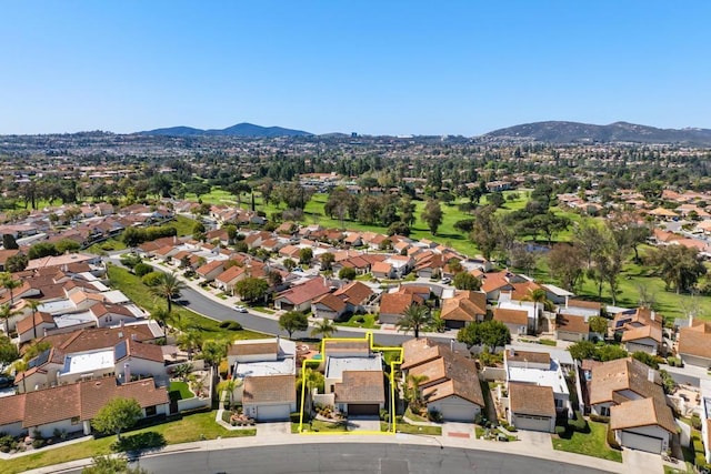 bird's eye view featuring a mountain view and a residential view