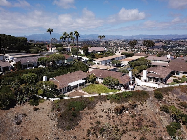 birds eye view of property featuring a residential view and a mountain view