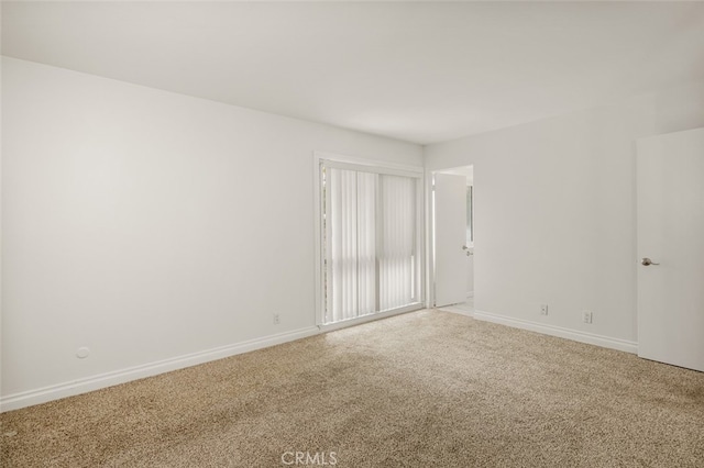 31711 Crystal Sands Dr, Laguna Niguel, CA 92677 - empty room featuring light carpet and baseboards
