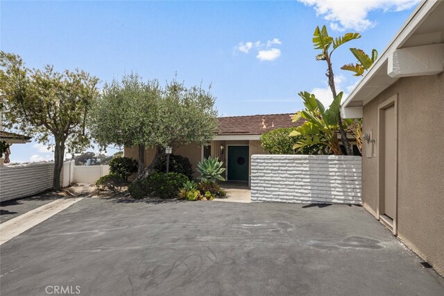 31711 Crystal Sands Dr, Laguna Niguel, CA 92677 - view of front of house with stucco siding and a patio area