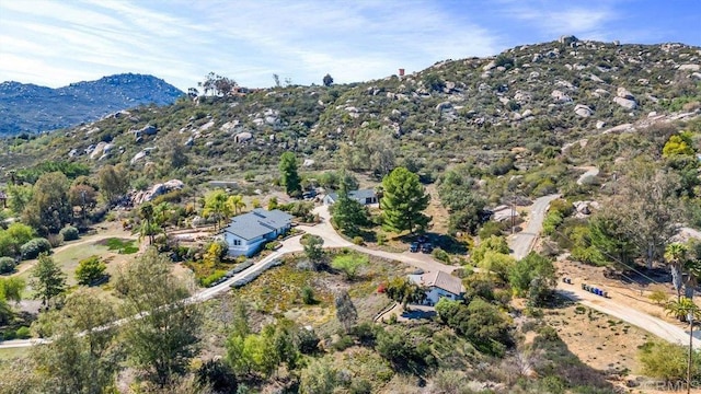 drone / aerial view featuring a mountain view