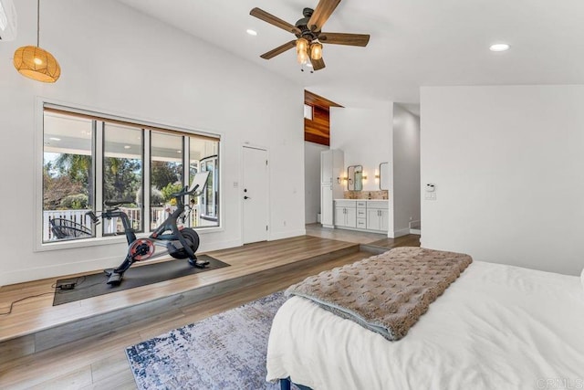 bedroom with recessed lighting, baseboards, and wood finished floors