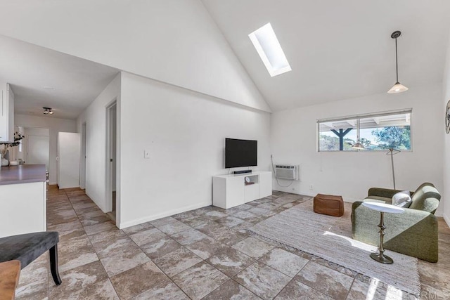 living room with baseboards, high vaulted ceiling, an AC wall unit, and a skylight