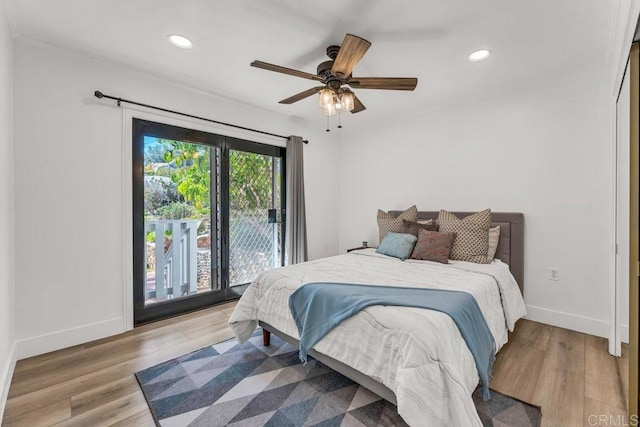 bedroom with access to exterior, ceiling fan, baseboards, recessed lighting, and wood finished floors