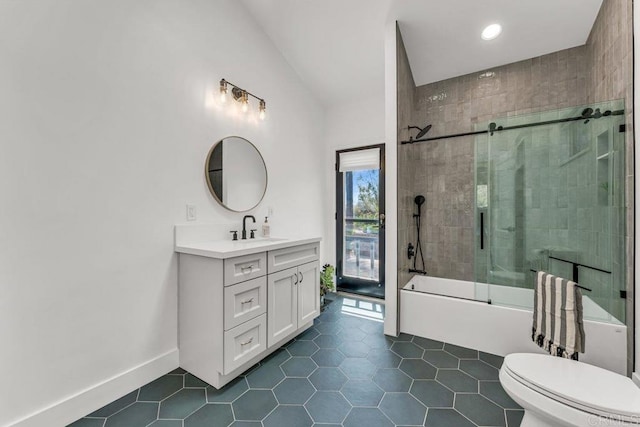 full bathroom with enclosed tub / shower combo, toilet, vanity, and tile patterned flooring