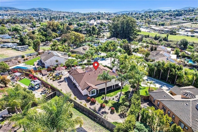 aerial view featuring a residential view and a mountain view