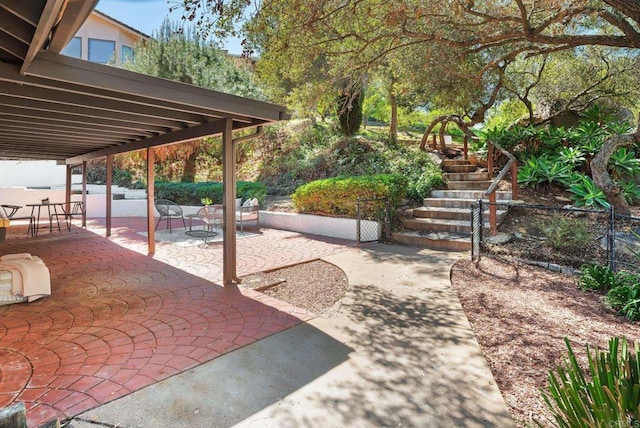 view of patio with fence